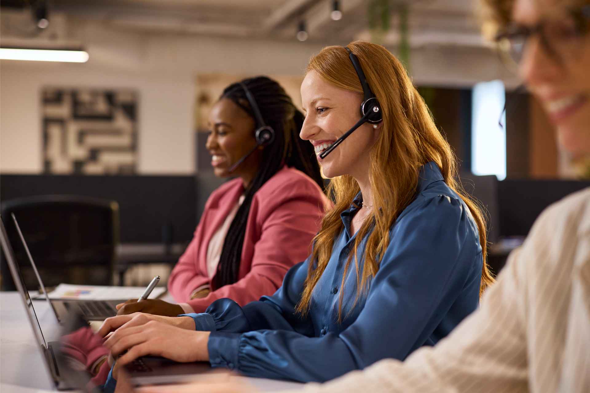 3 women using modern Business VoIP Phone Systems Oakville