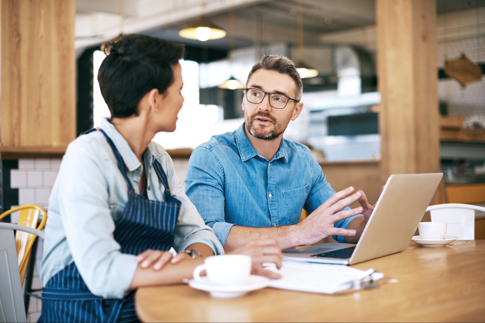small business owners discussing it support guelph services